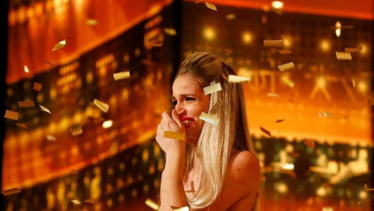 Heidi Klum Pushes AGT Golden Buzzer For Magical Quick-Change Artist